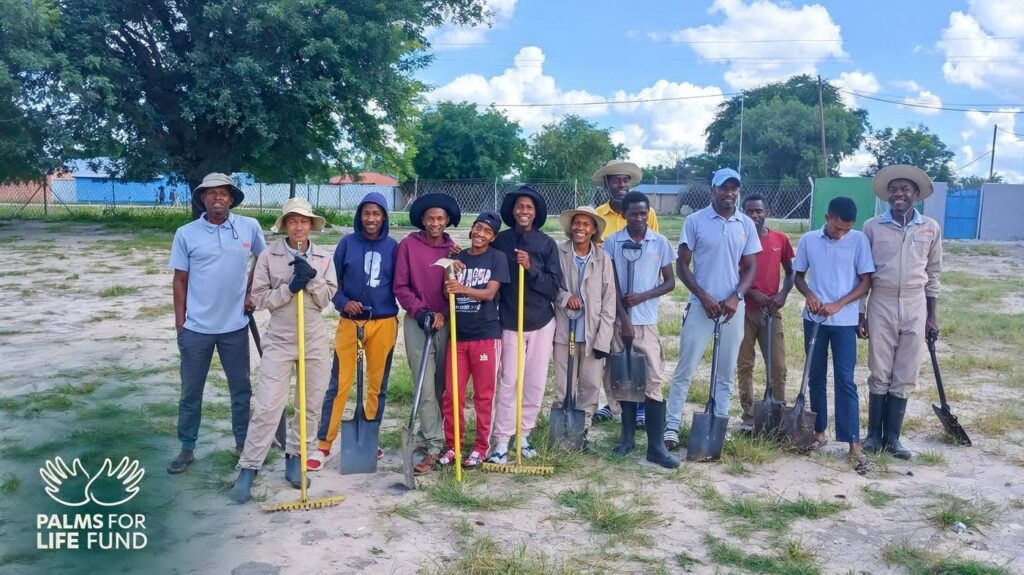 Rural youth participants with tools at a Palms for Life Fund empowerment session