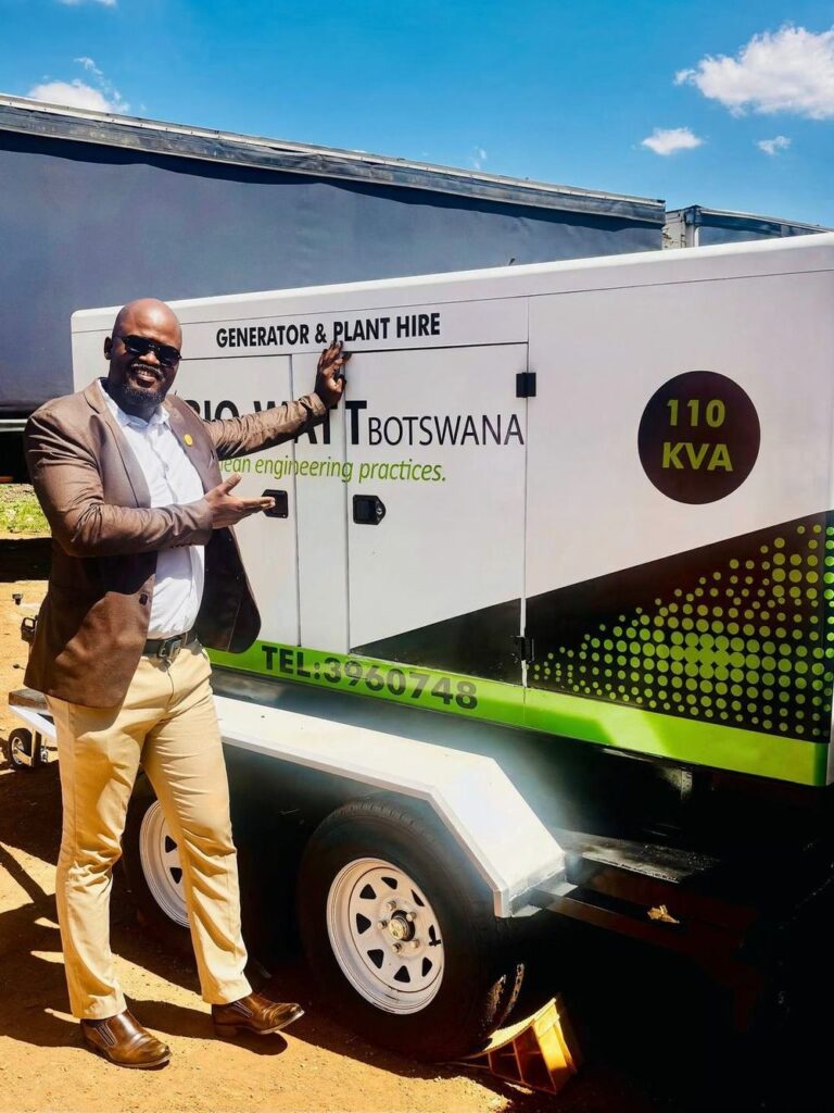 Entrepreneur Obuile Morewane presenting a Bio-Watt Botswana generator unit